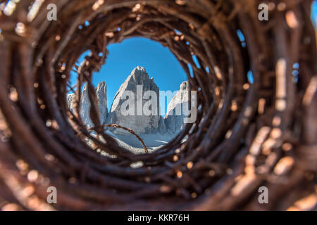 Sesto / Sexten, province of Bolzano, Dolomites, South Tyrol, Italy. Barbed wire from the First World War in front of the Three Peaks of Lavaredo Stock Photo