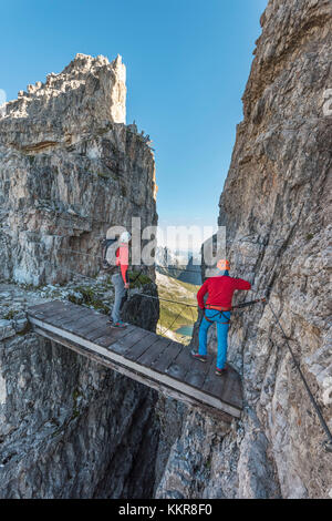 Sesto / Sexten, province of Bolzano, Dolomites, South Tyrol, Italy. Climber on the via ferrata 'Path of Peace' to the Mount Paterno Stock Photo