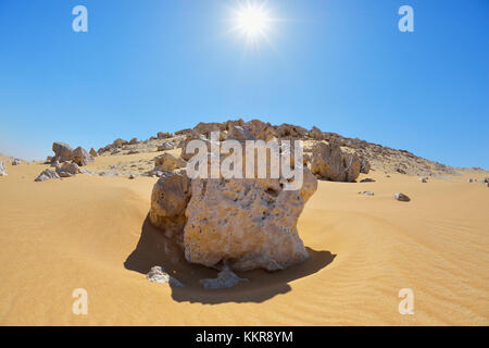 Rock in desert with sun, Matruh, Great Sand Sea, Libyan Desert, Sahara Desert, Egypt, North Africa, Africa Stock Photo