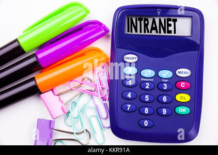 Writing word Intranet word cloud text in the office with surroundings such as marker, pen writing on calculator. Business concept for Internet Network Stock Photo