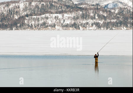 Ice fishing, Minami Furano Lake, Hokkaido, Japan, Asia