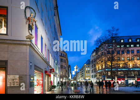 Germany, Bavaria, Munich, Theatiner Strasse shopping district, evening Stock Photo