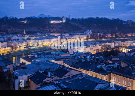 Austria, Salzburgerland, Salzburg, Museum der Moderne Monchsberg, modern art museum, above the city skyline, dawn, winter Stock Photo