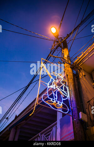 French West Indies, St-Martin, Grand Case, Gourmet Capital of the Caribbean, main street, dusk Stock Photo