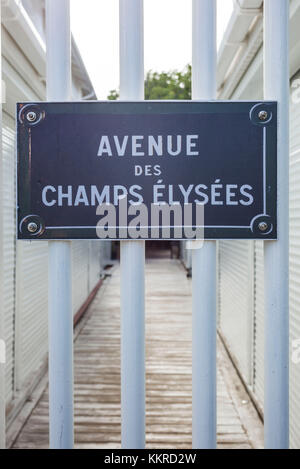 French West Indies, St-Martin, Grand Case, Gourmet Capital of the Caribbean, sign for the Avenue des Champs Elysees Stock Photo