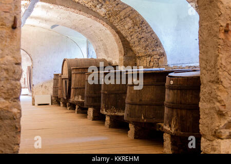 Wood barrels of wine cellar of the monastery of Astino, Longuelo, province of Bergamo, Lombardy, Italy, Europe Stock Photo