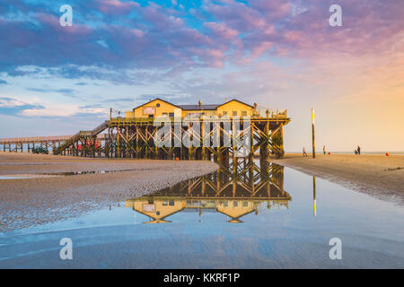 Sankt Peter-Ording, Eiderstedt, North Frisia, Schleswig-Holstein, Germany. Stilt house on the Wadden sea with low tide. Stock Photo