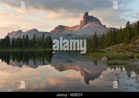 Dawn at Federa Lake with Becco di Mezzodì, Croda da Lago, Dolomites, Cortina d'Ampezzo, Veneto, Italy Stock Photo