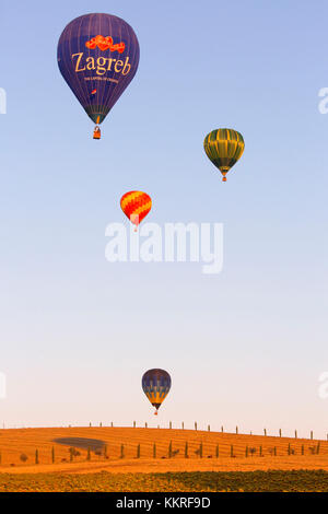 Europe, Italy, Umbria, Perugia district, Gualdo Cattaneo. Hot-air balloons Stock Photo