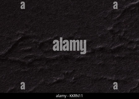 Black crumpled paper texture. Stock Photo