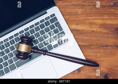 Judge gavel on computer. Concept of internet crime, hacking and cyber crimes Stock Photo