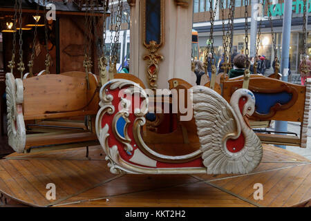 Mannheim, Germany. 01st Dec, 2017. A swan ride at an old-style children's swing ride. The Christmas market in Mannheim, Germany is held around the historic Wasserturm (water tower). Besides the food and craft stalls and carousels, it has an Enchanted Forest area, where scenes of ferry tales and statues of ferry tale characters are on display. Credit: Michael Debets/Pacific Press/Alamy Live News Stock Photo