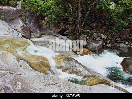 Josephine Falls - a tiered cascade waterfall on Josephine Creek at the base of Mount Bartle Frere in Wooroonooran National Park 75km south of Cairns Stock Photo