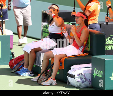 KEY BISCAYNE, FL - MARCH 29: Doubles partners Yung-Jan Chan of Taiwan and Martina Hingis of Switzerland on day 10 of the Miami Open at Crandon Park Tennis Center on March 29, 2017 in Key Biscayne, Florida.    People:  Martina Hingis, Yung-Jan Chan Stock Photo