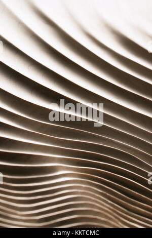 a background made from wood in design wave pattern on lighting Stock Photo