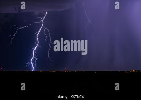 Summer lightning strike during a thunderstorm over Tucson, Arizona Stock Photo