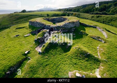 Carn Liath broch 2000 years fortified homestead on North Sea coast near Golspie, Sutherland, Scotland. West over the entrance Stock Photo