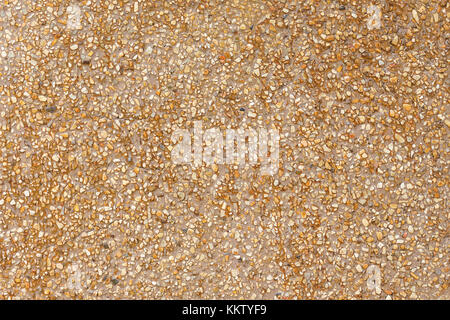 Natural sea sand texture, rough texture surface of exposed aggregate finish, Ground stone washed floor, made of small sand stone. Stock Photo