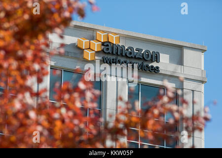 A logo sign outside of a facility occupied by Amazon Web Services (AWS) in Herndon, Virginia on November 26, 2017. Stock Photo