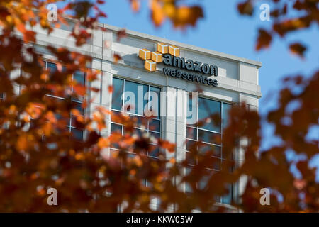 A logo sign outside of a facility occupied by Amazon Web Services (AWS) in Herndon, Virginia on November 26, 2017. Stock Photo