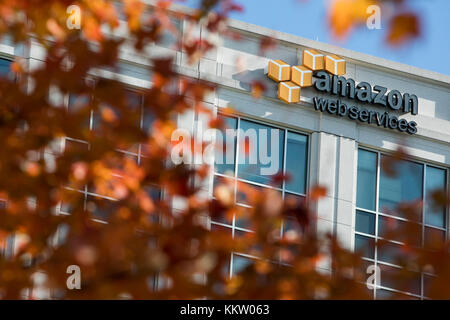 A logo sign outside of a facility occupied by Amazon Web Services (AWS) in Herndon, Virginia on November 26, 2017. Stock Photo