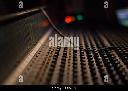 Mixer Board used by the engineer to adjust the quality of the music. Stock Photo