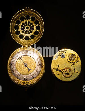 Antique gold watch on a black background. Stock Photo