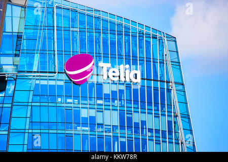 Vilnius, Lithuania - May 6, 2017: Glass windows in the modern office building skyscraper in the business district Stock Photo