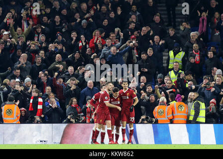 Liverpool's Philippe Coutinho (centre) celebrates with his team-mates after scoring his side's fourth goal during the Premier League match at the AMEX Stadium, Brighton. PRESS ASSOCIATION Photo Picture date: Saturday December 2, 2017. See PA story SOCCER Brighton. Photo credit should read: Gareth Fuller/PA Wire. RESTRICTIONS: EDITORIAL USE ONLY No use with unauthorised audio, video, data, fixture lists, club/league logos or 'live' services. Online in-match use limited to 75 images, no video emulation. No use in betting, games or single club/league/player publications. Stock Photo
