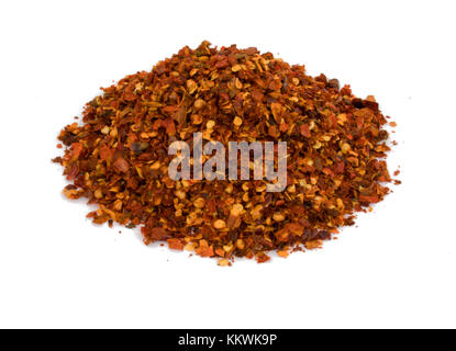 Dried chili pieces red pepper crushes isolated on white background Stock Photo
