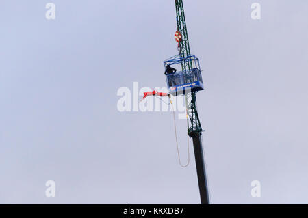 Glasgow, Scotland, UK. 2nd Dec, 2017. Santa enjoys a 160ft crane bungee jump in Glasgow. Credit: Skully/Alamy Live News Stock Photo