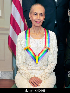 Washington DC, USA. 2nd December, 2017. Carmen de Lavallade, one of he five recipients of the 40th Annual Kennedy Center Honors with his award as he poses for a group photo following a dinner hosted by United States Secretary of State Rex Tillerson in their honor at the US Department of State in Washington, DC on Saturday, December 2, 2017. The 2017 honorees are: American dancer and choreographer Carmen de Lavallade; Cuban American singer-songwriter and actress Gloria Estefan; ; American television writer and producer Norman Lear; and Ame Credit: MediaPunch Inc/Alamy Live News Stock Photo