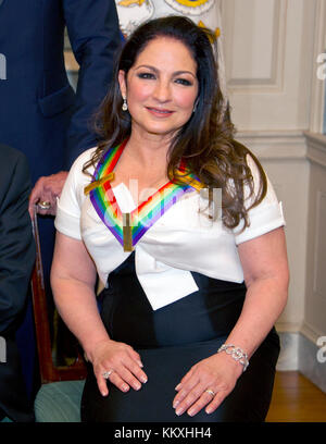 Washington DC, USA. 2nd December, 2017. Gloria Estefan, one of he five recipients of the 40th Annual Kennedy Center Honors with his award as he poses for a group photo following a dinner hosted by United States Secretary of State Rex Tillerson in their honor at the US Department of State in Washington, DC on Saturday, December 2, 2017. The 2017 honorees are: American dancer and choreographer Carmen de Lavallade; Cuban American singer-songwriter and actress Gloria Estefan; ; American television writer and producer Norman Lear; and American Credit: MediaPunch Inc/Alamy Live News Stock Photo