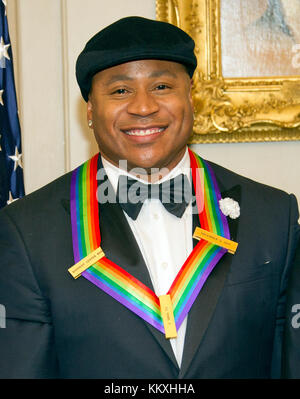 Washington DC, USA. 2nd December, 2017. LL COOL J, one of he five recipients of the 40th Annual Kennedy Center Honors with his award as he poses for a group photo following a dinner hosted by United States Secretary of State Rex Tillerson in their honor at the US Department of State in Washington, DC on Saturday, December 2, 2017. The 2017 honorees are: American dancer and choreographer Carmen de Lavallade; Cuban American singer-songwriter and actress Gloria Estefan; ; American television writer and producer Norman Lear; and American musi Credit: MediaPunch Inc/Alamy Live News Stock Photo