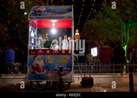 Bethlehem, West Bank. 2nd December, 2017. Street food car dressed in Holiday theme as large crowd gathered to celebrate the lighting of the holiday Chrstmas tree in front of the Church of Nativity in Bethlehem, West Bank, Palestine Credit: Gabi Berger/Alamy Live News Stock Photo