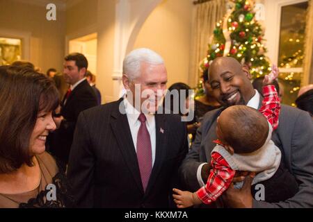 U.S. Vice President Mike Pence and Karen Pence, left, host Secret Service families for a Christmas party at the Naval Observatory residence December 2, 2017 in Washington, D.C. Stock Photo