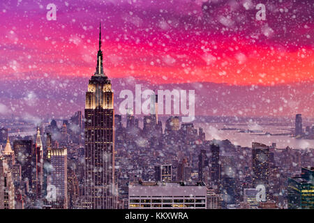 Snow falling down in New York City Stock Photo