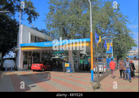 People buy petrol at Bharat Petroleum petrol station in Mumbai India. Bharat Petroleum is Indian state controlled Maharatna oil and gas company. Stock Photo