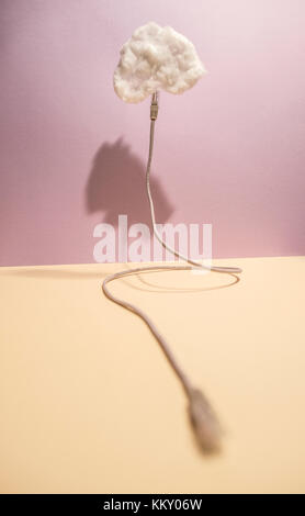 Clouds conception with cotton cloud and USB cable Stock Photo