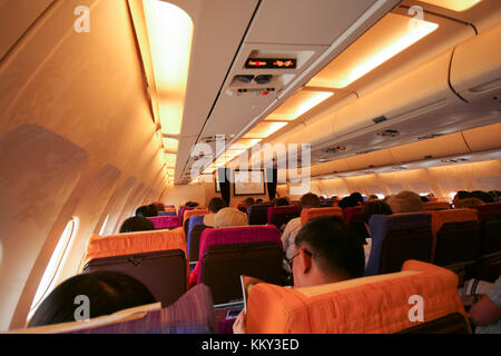 Phuket, Thailand - MARCH 16, 2009: Cabin photo of Airbus a300-600 thaiairway. photo inflight from chiangmai to phuket airport. Stock Photo