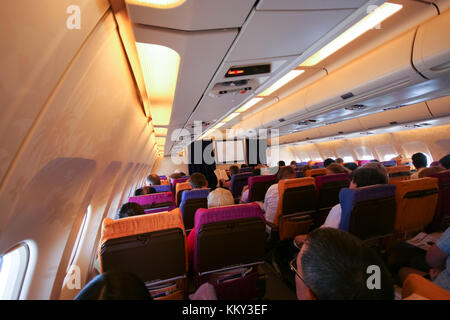 Phuket, Thailand - MARCH 16, 2009: Cabin photo of Airbus a300-600 thaiairway. photo inflight from chiangmai to phuket airport. Stock Photo