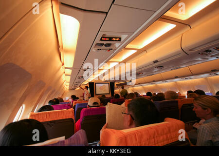 Phuket, Thailand - MARCH 16, 2009: Cabin photo of Airbus a300-600 thaiairway. photo inflight from chiangmai to phuket airport. Stock Photo