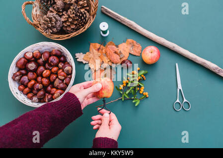 DIY, autumnal decoration, mobile, natural materials, crafting, women's hands, detail, Stock Photo
