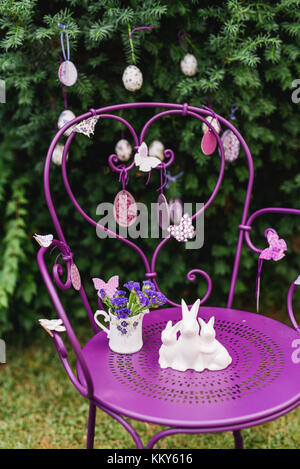 Easter decoration, garden chair, porcelain figure, Easter bunny, Stock Photo