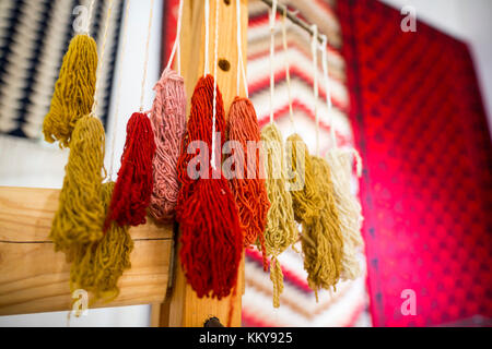 Weaving equipment for Chiprovtsi Carpets. Traditional colorful carpets from Chiprovtsi region in Bulgaria. Hand-woven (hand-made) carpets with differe Stock Photo