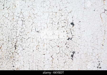 Old white metal wall with peeling paint, frontal background photo texture Stock Photo