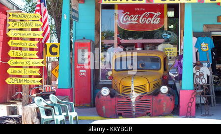 Seligman, Arizona, USA, June 23, 2013: A vintage truck in front of Seligman Sundries Gift Shop on Route 66. Stock Photo