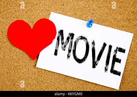 Conceptual hand writing text caption inspiration showing Movie concept for Entertainment Movie Film and Love written on sticky note, reminder cork bac Stock Photo