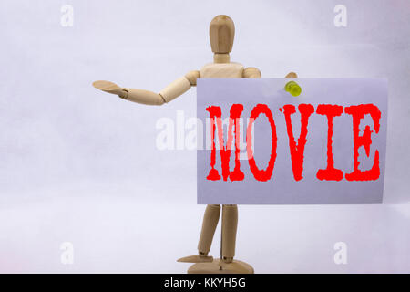 Conceptual hand writing text caption inspiration showing Movie Business concept for Entertainment Movie Film written sticky note sculpture background  Stock Photo