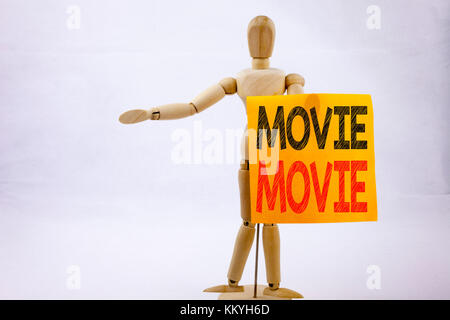 Conceptual hand writing text caption inspiration showing Movie Business concept for Entertainment Movie Film written on sticky note sculpture backgrou Stock Photo